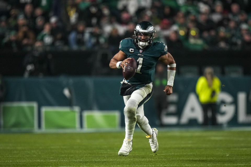 Philadelphia Eagles quarterback Jalen Hurts runs for yardage against the San Francisco 49ers during the second half of an NFL football game, Sunday, Dec. 3, 2023, in Philadelphia. (AP Photo/Matt Slocum)