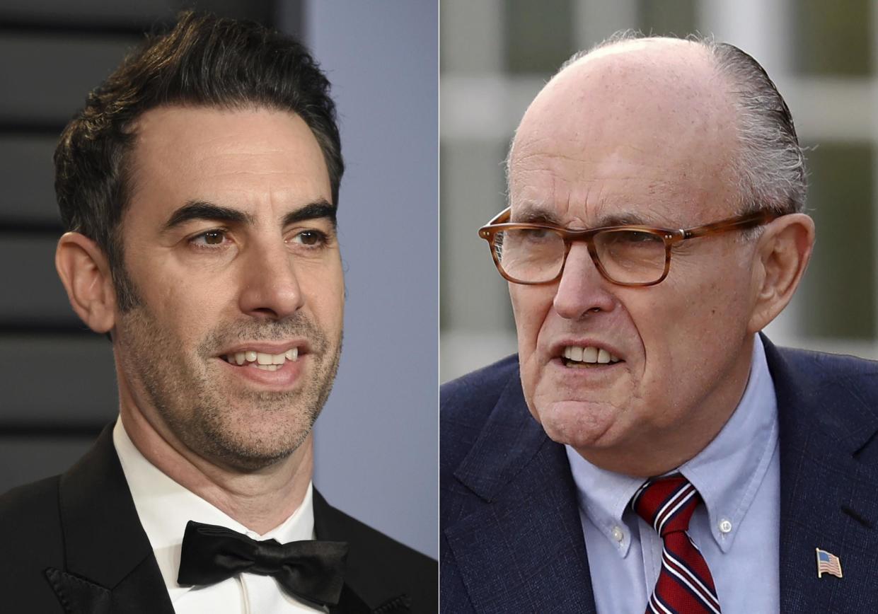 Sacha Baron Cohen and Rudy Giuliani: AP