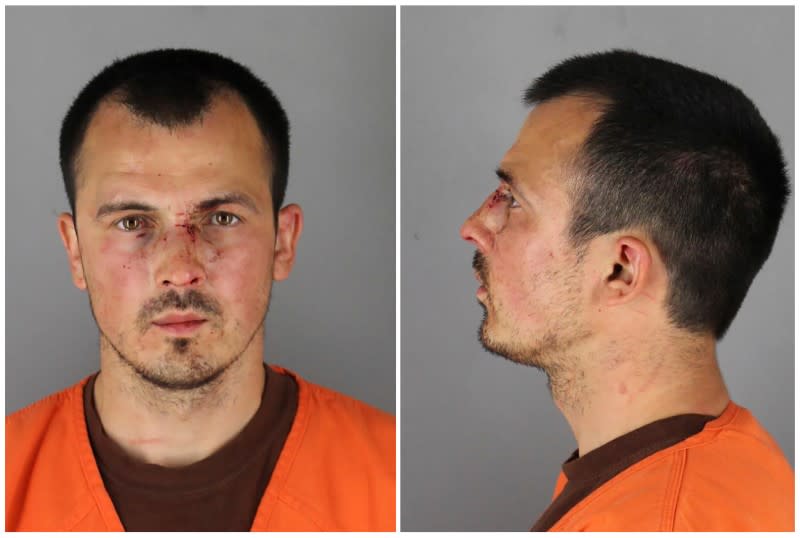 Bogdan Vechirko poses for a booking photograph in Minnesota