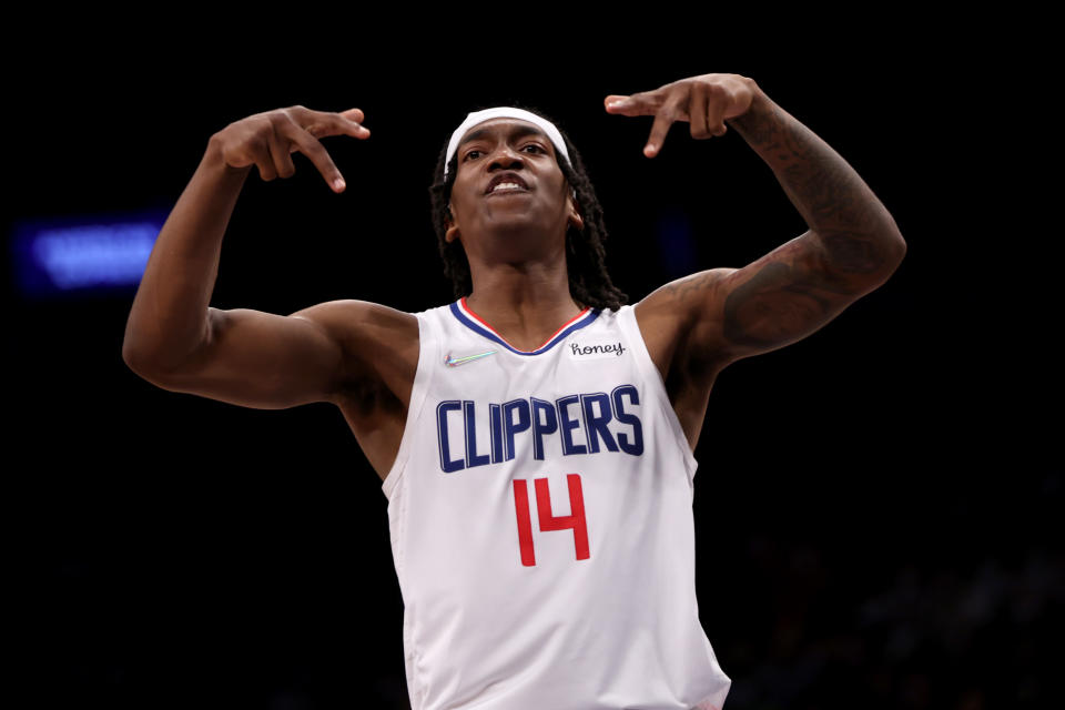 Pictured here, LA Clippers star Terance Mann reacts after making a three-pointer during the fourth quarter against the Brooklyn Nets.