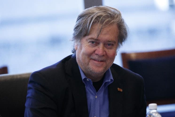 Steve Bannon, campaign CEO for Republican presidential candidate Donald Trump, right, looks on during a national security meeting with advisors at Trump Tower, Friday, Oct. 7, 2016, in New York. (Photo: Evan Vucci/AP)