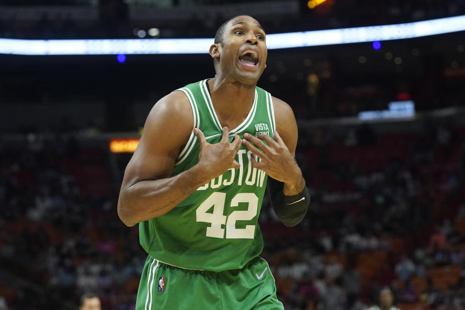 Boston Celtics center Al Horford (42) reacts to a call during the first half of an NBA basketball gameagainst the Miami Heat, Thursday, Nov. 4, 2021, in Miami. (AP Photo/Marta Lavandier)