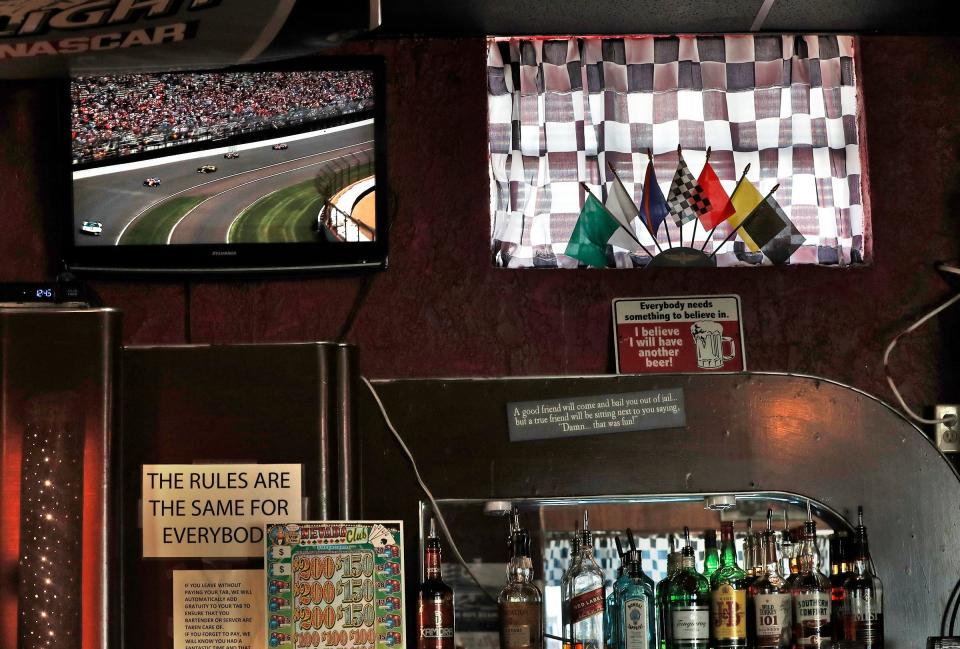 TVs are on for people to watch the Indy 500 and festivities live Sunday, May 30, 2021 at Mike's Speedway Lounge in Speedway. The race was not blacked out this year.