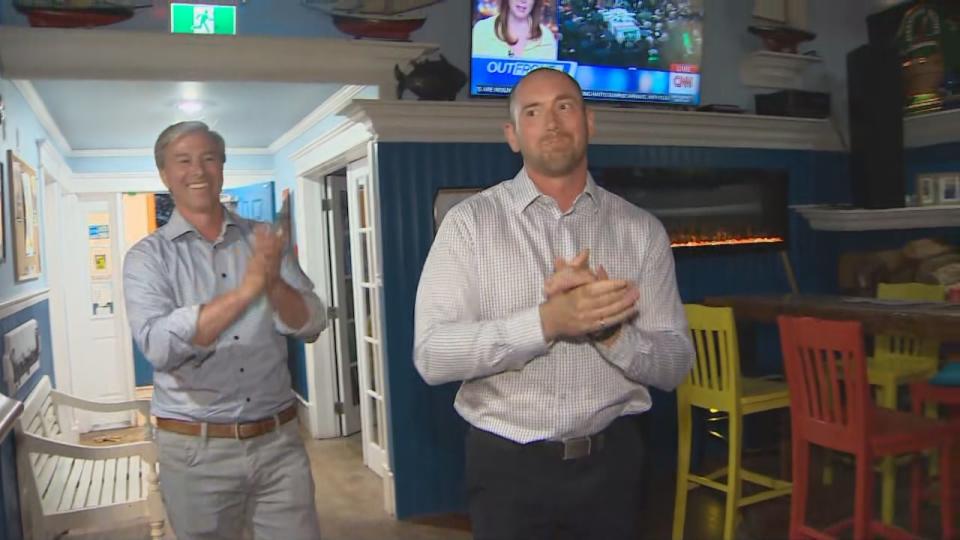 Premier Tim Houston with the PC's Marco MacLeod after results indicated MacLeod was the unofficial winner of the Pictou West byelection.