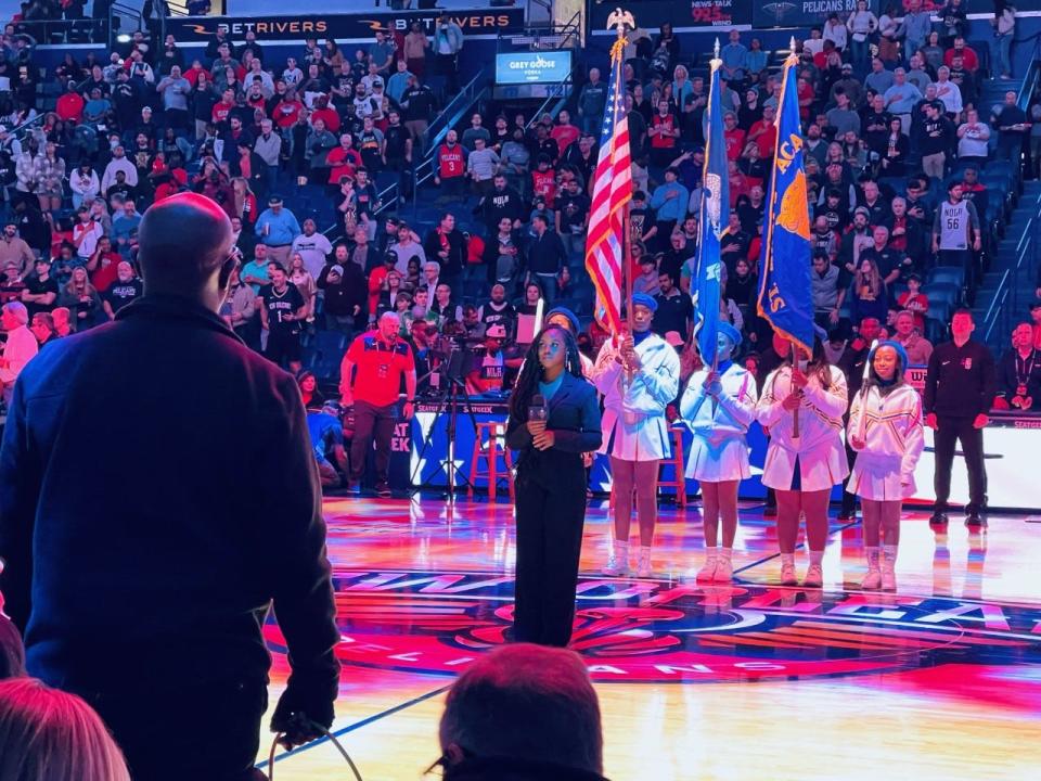 Gibson native Kyante' Brumfield, 28, performs the national anthem ahead of the New Orleans Pelicans game on Nov. 28, 2022.