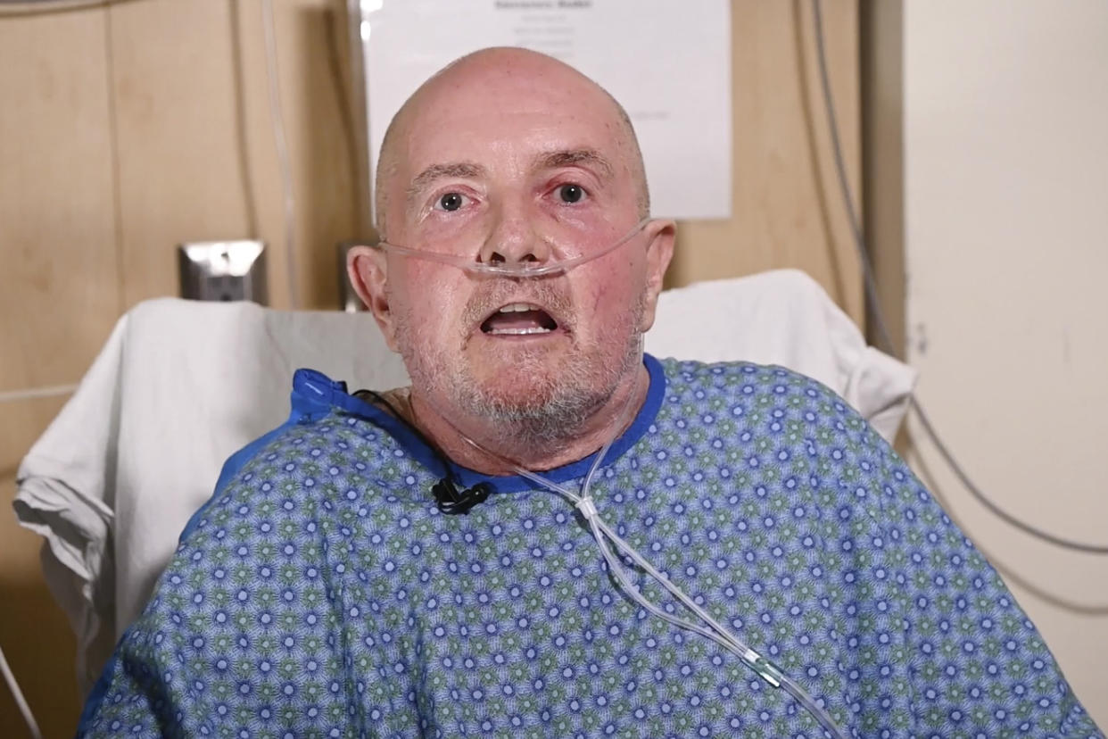 In this image from video provided UCHealth Memorial Hospital Central, Club Q shooting survivor Ed Sanders talks, Monday, Nov. 21, 2022, about the incident in Colorado Springs Colo. Sanders, 63, says he wants to be resilient and won't be "taken out by some sick person.” He has been a patron of Club Q for 20 years — and was even there on the club's opening night. (Sonya Doctorian/UCHealth Memorial Hospital Central via AP)