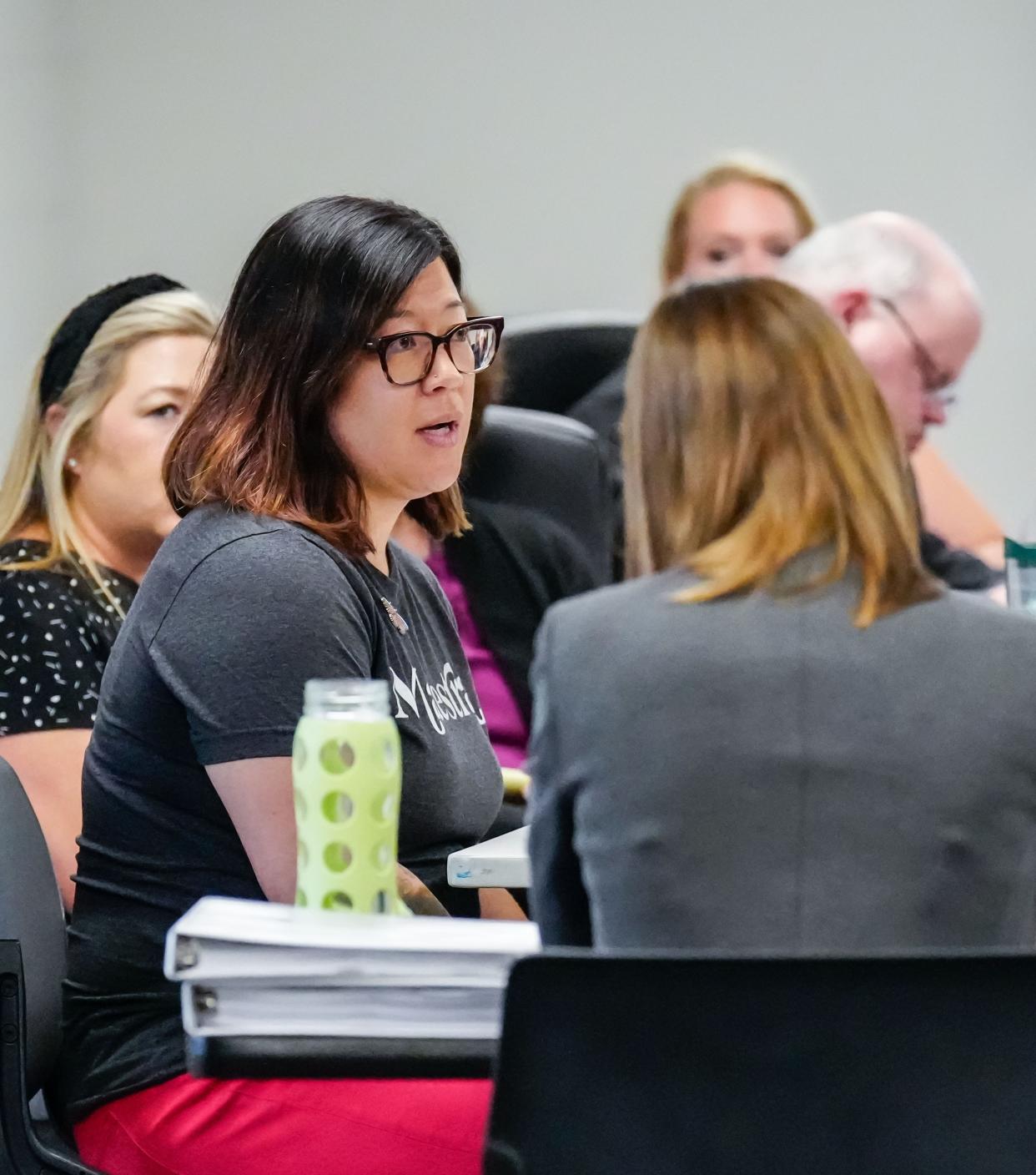 Heyer Elementary School teacher Melissa Tempel testifies during a Waukesha School Board termination hearing on July 12. Waukesha School District superintendent James Sebert recommended Tempel be fired for a tweet criticizing the district's decision to ban the Miley Cyrus and Dolly Parton song "Rainbowland."