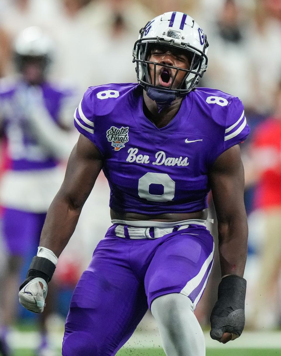 Ben Davis Giants linebacker Nylan Brown (8) yells in excitement Saturday, Nov. 25, 2023, during the IHSAA Class 6A football state championship game at Lucas Oil Stadium in Indianapolis. The Ben Davis Giants defeated the Crown Point Bulldogs, 38-10.