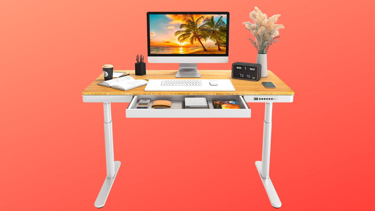 Stand up, stretch your legs, and stay healthier with this standing desk. (Photo: Amazon)