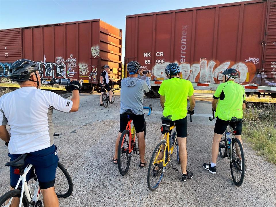 Saturday was not a training ride, but Bo Green's group of bicyclists had to wait for an eastbound train to pass in Elmdale on Leg 3 of their journey. June 25 2022