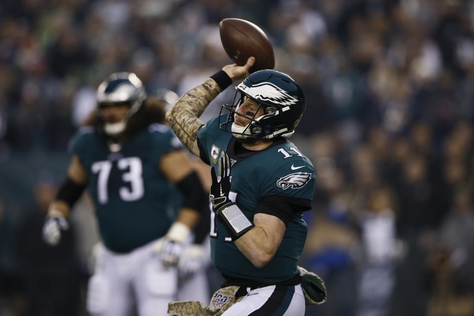 Philadelphia Eagles' Carson Wentz passes during the first half of an NFL football game against the New England Patriots, Sunday, Nov. 17, 2019, in Philadelphia. (AP Photo/Michael Perez)