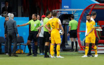 Soccer Football - World Cup - Group C - France vs Australia - Kazan Arena, Kazan, Russia - June 16, 2018 Referee Andres Cunha reviews a incident on VAR before awarding a penalty to France REUTERS/John Sibley