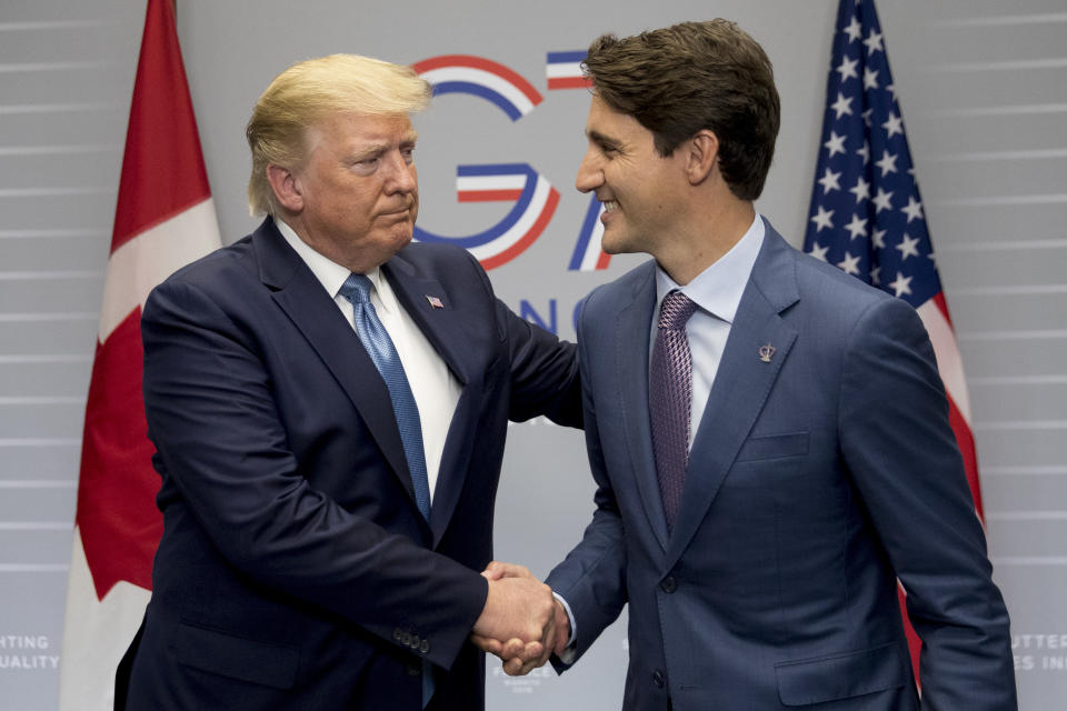 U.S President Donald Trump and Canada Prime Minister Justin Trudeau participate in a bilateral meeting at the G-7 summit in Biarritz, France, Sunday, Aug. 25, 2019. (AP Photo/Andrew Harnik)