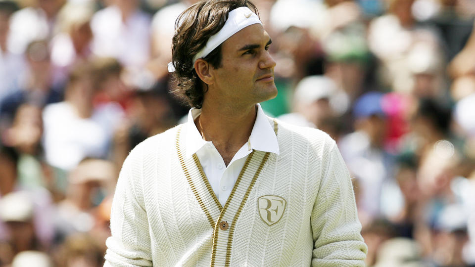 Roger Federer, pictured here wearing a sweater with his logo at Wimbledon in 2008.