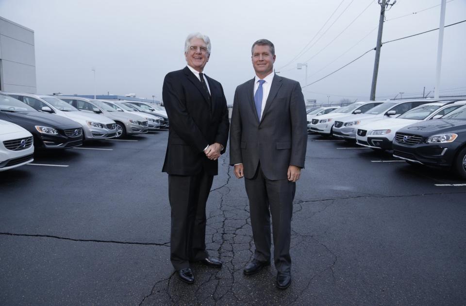 David Fischer and his son David Fischer Jr. of The Suburban Collection in Troy.