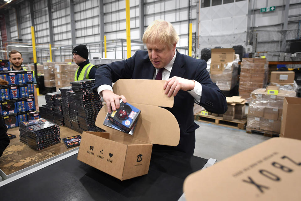 Prime Minister Boris Johnson during a visit to The Hut Group in Burtonwood, Warrington, while on the General Election campaign trail.