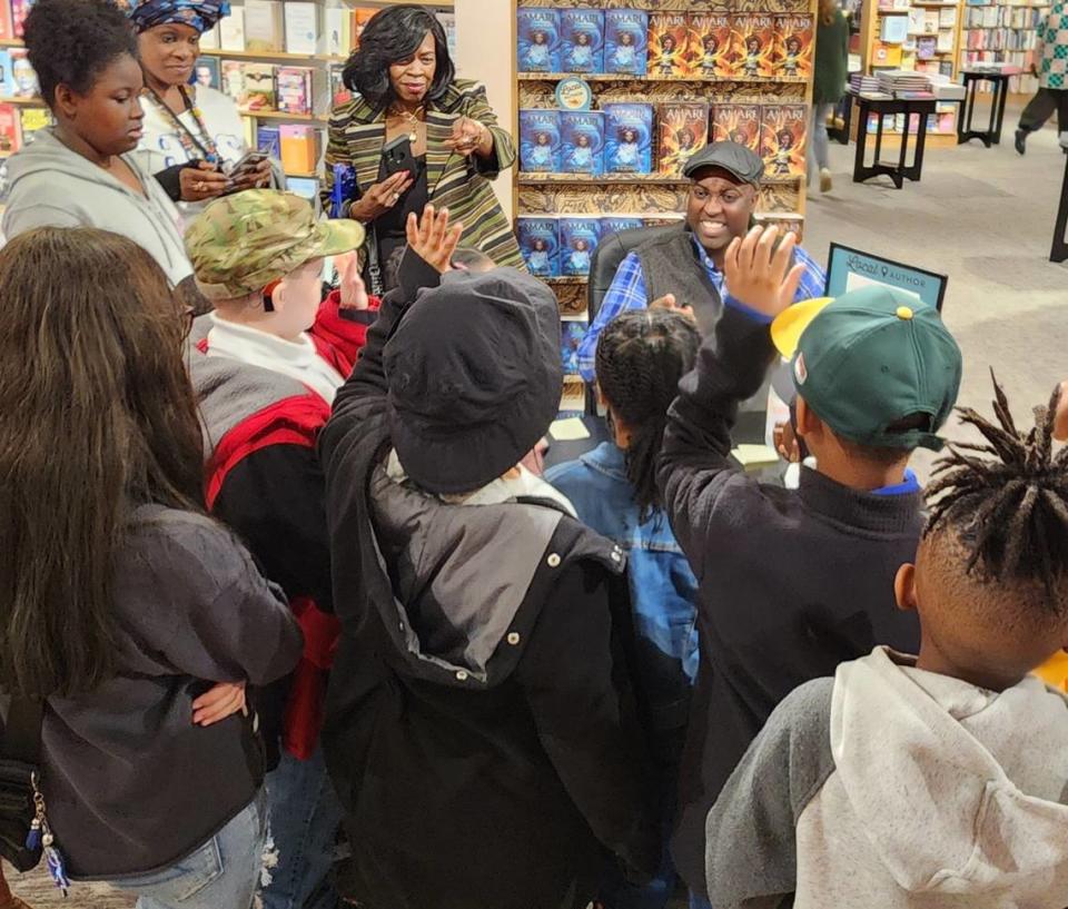 Kids line up to speak with author B.B. Alston on Wednesday, March 6, 2024 at the new Columbia Barnes & Noble.