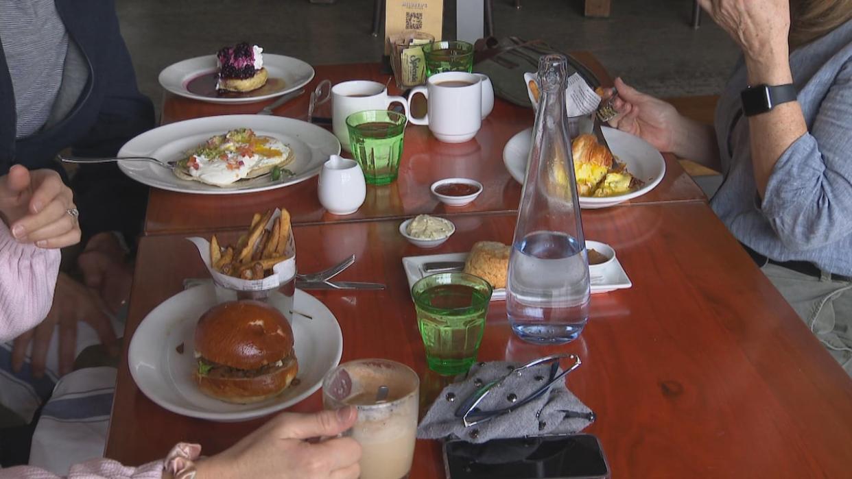 People dined at Mildred's Temple Kitchen on Friday, the first day of Winterlicious 2024. (Susan Goodspeed/CBC - image credit)