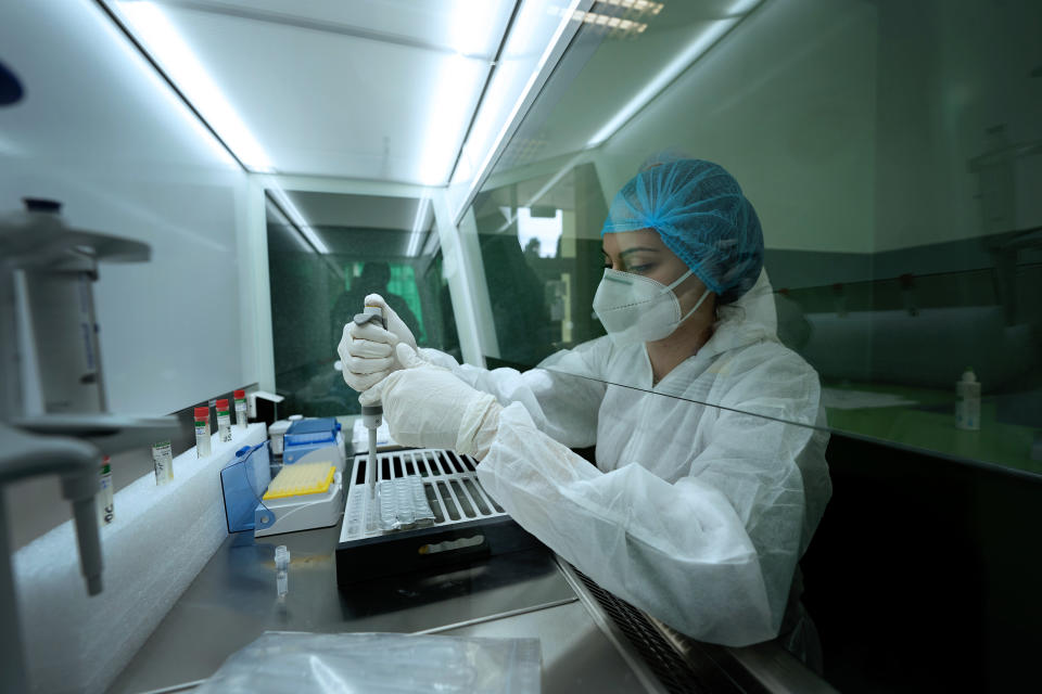 Making a discovery in science . Cropped shot of a young woman scientist working in his lab.