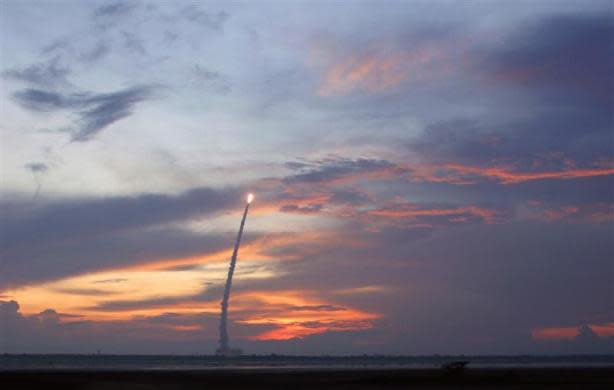 India's Polar Satellite Launch Vehicle (PSLV) C-19 blasts off, carrying the country's first radar imaging satellite RISAT-1 from the Satish Dhawan space centre at Sriharikota, north of the southern Indian city of Chennai April 26, 2012. The satellite weighing 1858 kg is a remote sensing satellite with a synthetic aperture radar that can penetrate clouds and picture the earth day and night, local media reported.