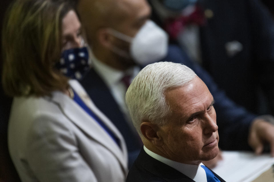 Then-Vice President Mike Pence and Speaker of the House Nancy Pelosi are seen during a joint session of Congress.