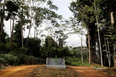 A cross stands at the site where Sister Dorothy Stang was assassinated, at Esperanca PDS in Anapu