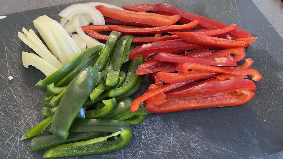 Sliced onion and peppers for fajitas