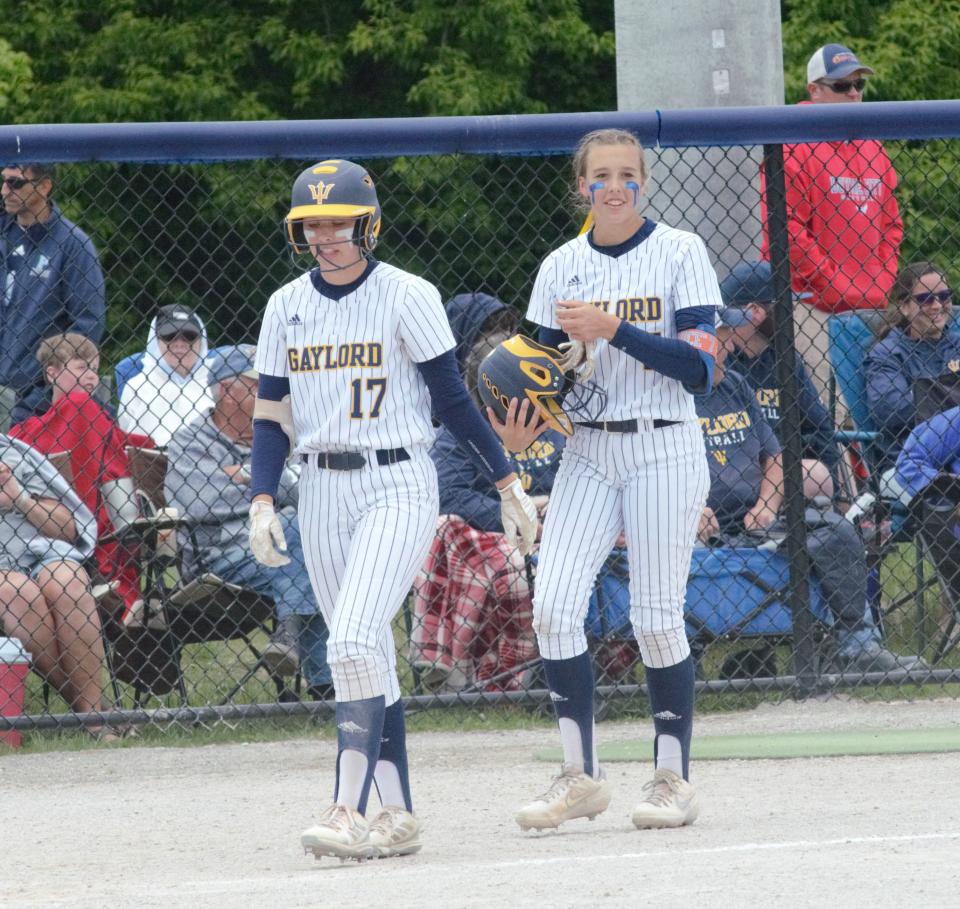 Gaylord's Jayden Jones (left) and Aubrey Jones (right) prepare to shake hands after defeating Gladwin in the MHSAA Division 2 district semifinal game on Saturday, June 4 at Petoskey High School.