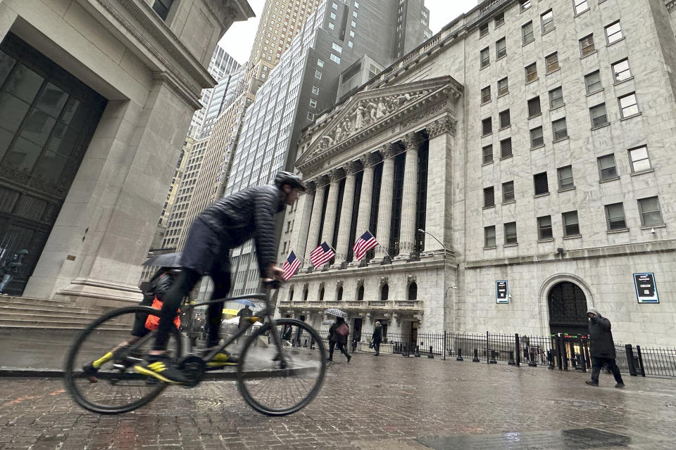 CORRECTS TO 1.1% HIGHER STED OF TK% HIGHER FILE - A bicyclist passes the New York Stock Exchange on March 5, 2024, in New York. Stocks are rising Monday, March 18, 2024 ahead of a busy week for central banks around the world that could dictate where interest rates go. The S&P 500 was 1.1% higher in early trading, coming off its first back-to-back weekly loss since October. (AP Photo/Peter Morgan, file)