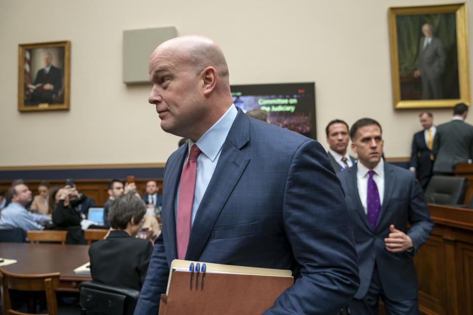 Acting Attorney General Matthew Whitaker arrives to testify before the House Judiciary Committee on Capitol Hill in Washington, Friday, Feb. 8, 2019. (AP Photo/J. Scott Applewhite)