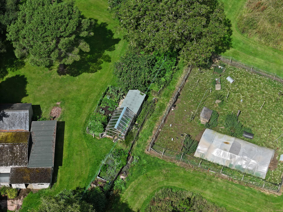 DJI Air 3 photo of a large garden and allotment  on a sunny day with the 70mm telephoto camera