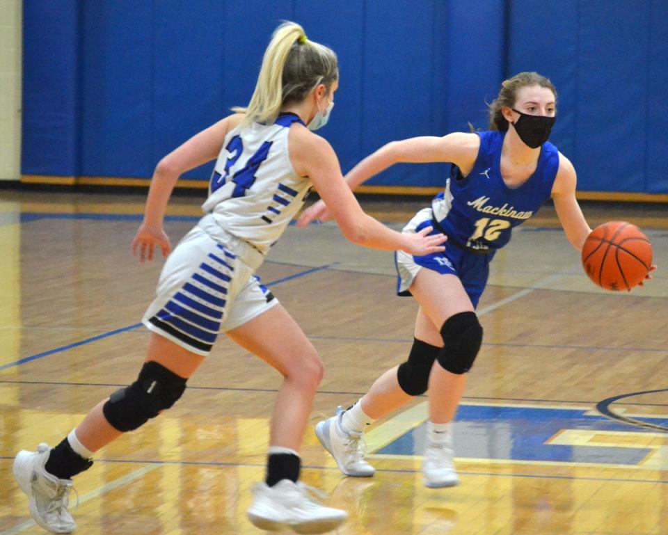 Junior guard Larissa Huffman, right, and the Mackinaw City varsity girls basketball team opened their season with a dominating win at Rogers City on Friday night.