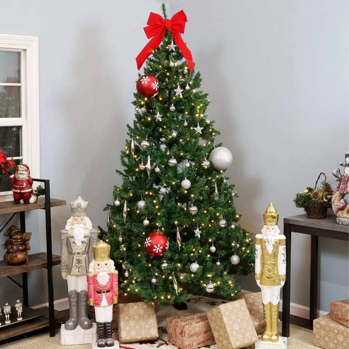 the decorated tree with presents underneath