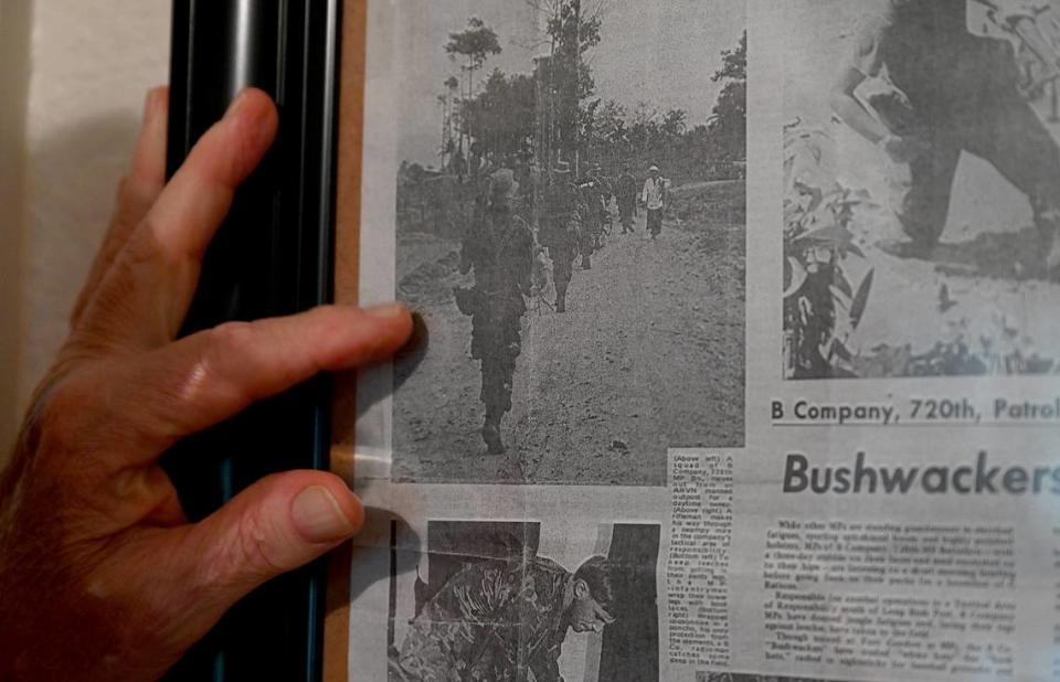 Fifty-three years after his U. S. Army service in Vietnam, Jared Kelley, of Bradenton, received the Bronze Star Medal for meritorious service. Kelley points to a photograph of himself in Vietnam from Stars and Stripes, an American military newspaper.