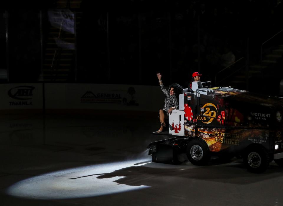 One of a few drag queens performing for Pride Weekend takes a ride on the Zamboni during the first break before the second period of the Firebirds game at Acrisure Arena in Palm Desert, Calif., Saturday, Jan. 7, 2023. 