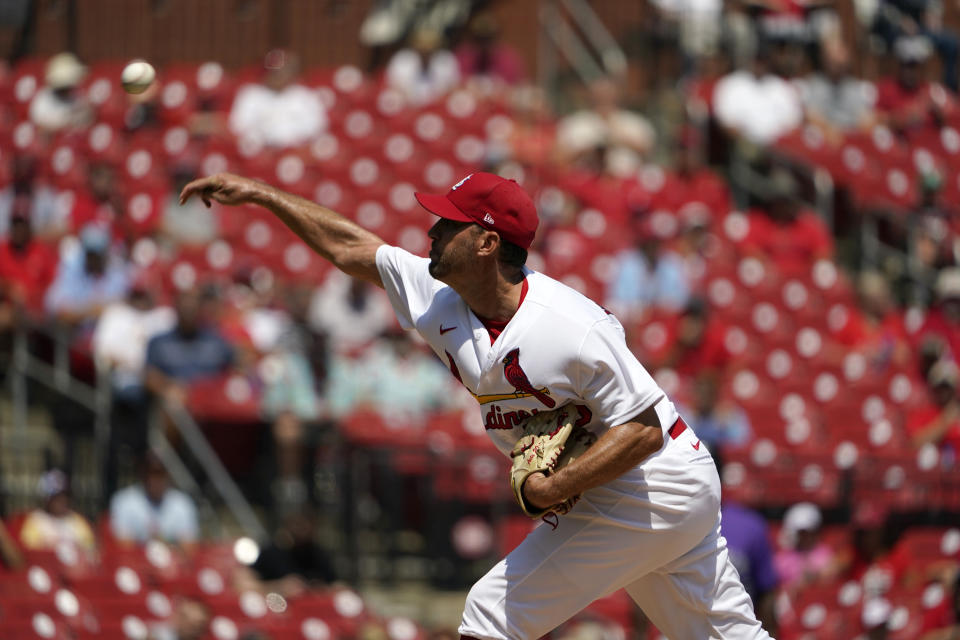 St. Louis Cardinals starting pitcher Adam Wainwright throws during the first inning of a baseball game against the Colorado Rockies Thursday, Aug. 18, 2022, in St. Louis. (AP Photo/Jeff Roberson)