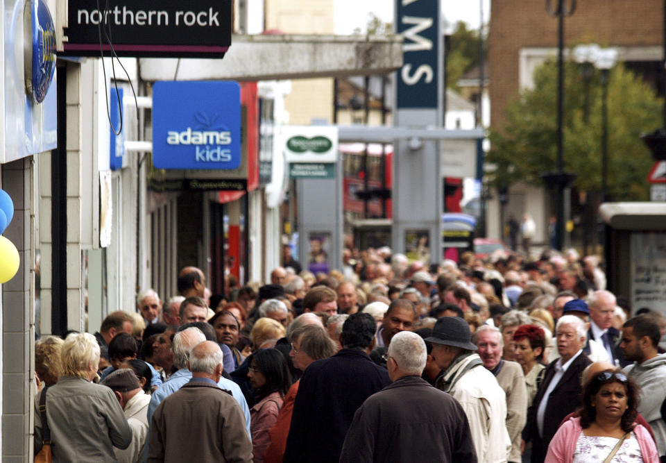 File - Customers stand in a queue outside a branch of the Northern Rock, the British mortgage lender, in Harrow, London, on Monday Sept. 17, 2007. Shares of Northern Rock were hit by a liquidity crisis which sent customers lining up to withdraw deposits. The recent failure of the Silicon Valley Bank was unlike a traditional bank run. It involved Twitter, internet memes and message boards and happened at unprecedented speed. (AP Photo/ Max Nash, File)