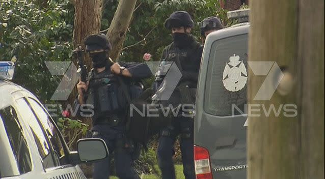 Police initially used capsicum spray on the knifeman but it reportedly had no effect, so a TASER was used to bring the situation to a peaceful resolution. Pictures: 7 News