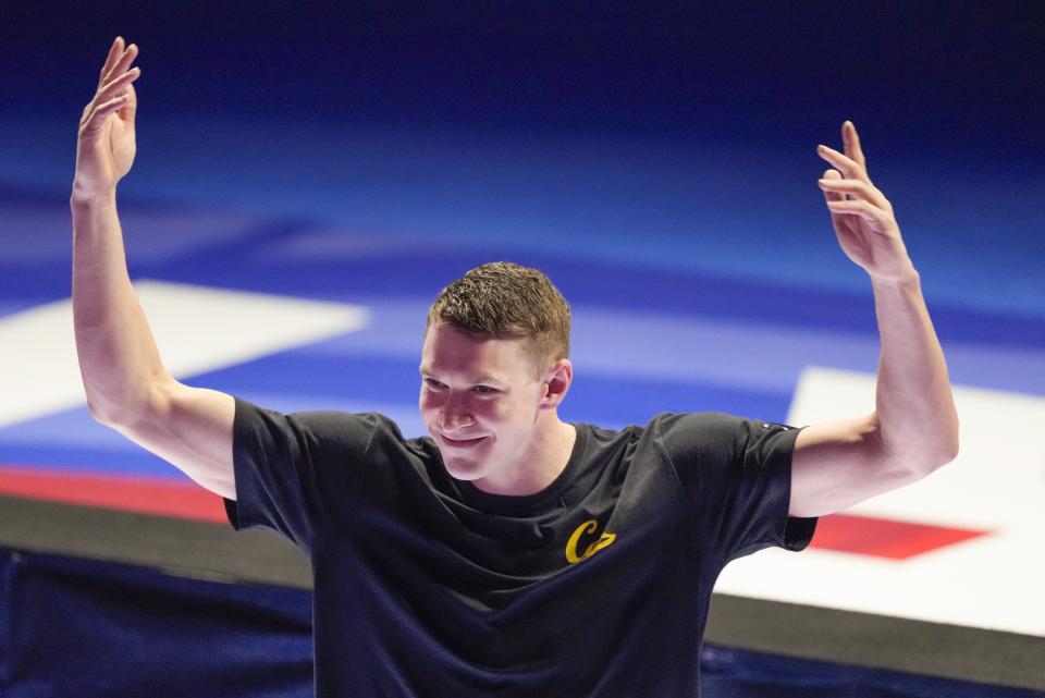 Ryan Murphy celebrates after winning the Men's 100 backstroke finals Monday, June 17, 2024, at the US Swimming Olympic Trials in Indianapolis. (AP Photo/Michael Conroy)