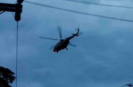 A military helicopter believed to be carrying rescued schoolboys takes off near Tham Luang cave complex in the northern province of Chiang Rai, Thailand, July 8, 2018. REUTERS/Soe Zeya Tun