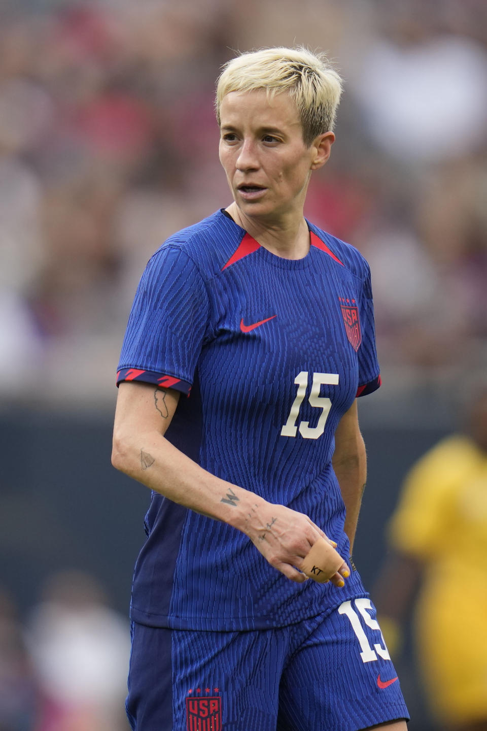 United States forward Megan Rapinoe walks the pitch after missing the goal during the first half of a soccer game against South Africa, Sunday, Sept. 24, 2023, in Chicago. (AP Photo/Erin Hooley)