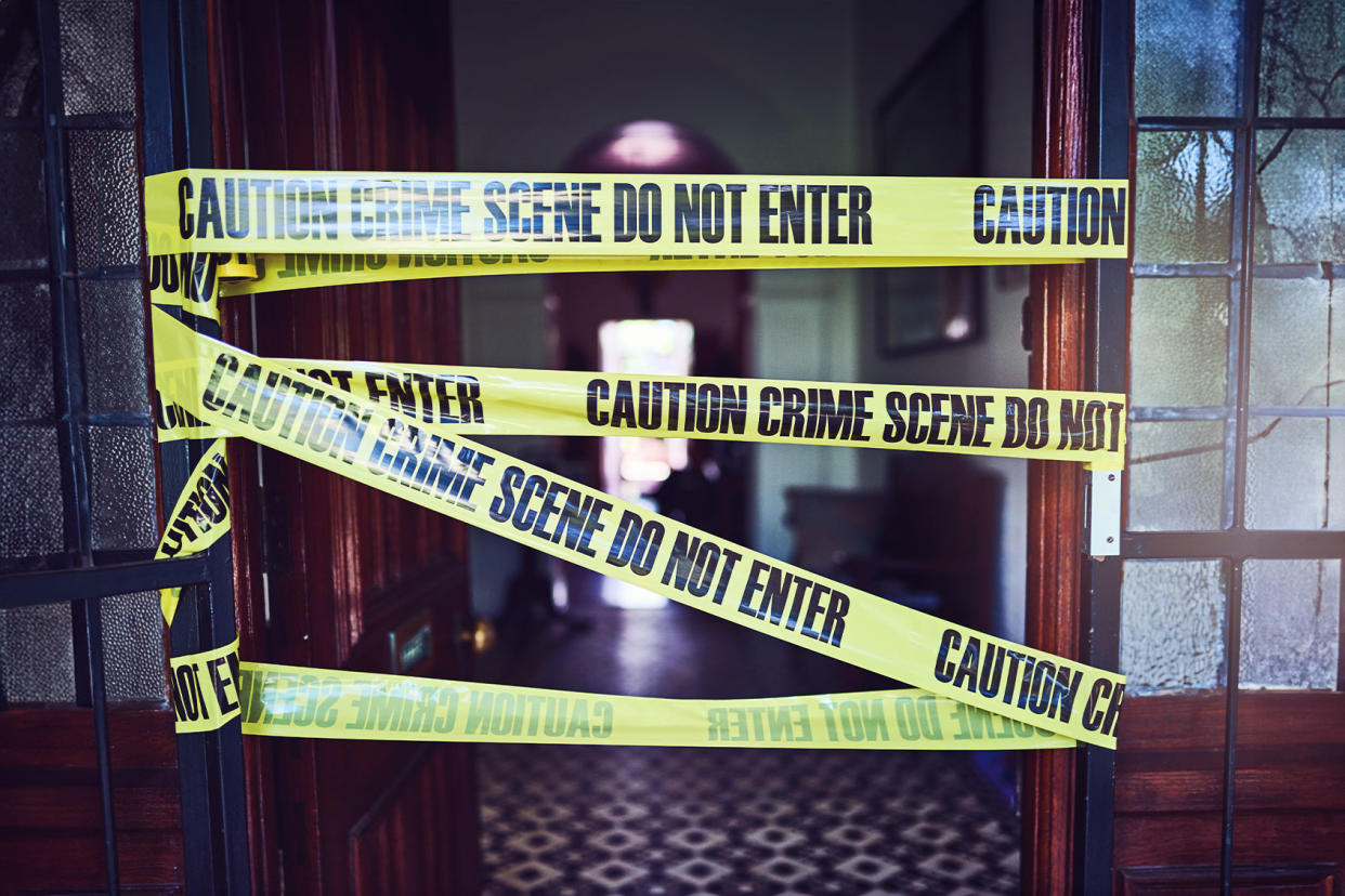 Shot of crime scene tape put up at a scene to warn off people Getty Images/Charday Penn