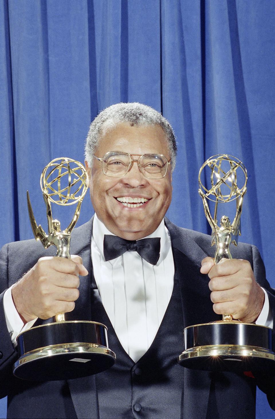 1991: Actor James Earl Jones holds up his two Emmys for photographers backstage at the 43rd annual Emmy Awards in Pasadena, Sunday, August 25, 1991. Jones won Emmys for best lead actor in a drama series for 