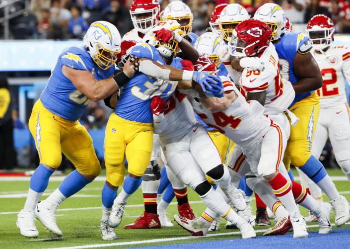 Chargers running back Austin Ekeler (30) runs in for a touchdown against the Kansas City Chiefs.