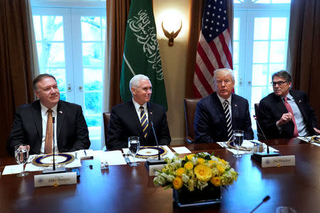 U.S. President Donald Trump, flanked by Central Intelligence Agency (CIA) Director Mike Pompeo, ‪Vice President Mike Pence‬ and Energy Secretary Rick Perry, hosts Saudi Arabia's Crown Prince Mohammed bin Salman for a working lunch at the White House in Washington, U.S. March 20, 2018. REUTERS/Jonathan Ernst