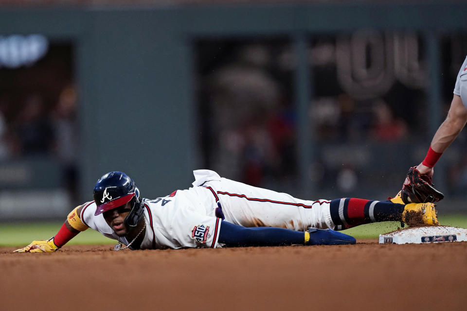 Atlanta Braves' Ronald Acuna Jr. steals second base in the sixth inning of the team's baseball game against the St. Louis Cardinals on Thursday, June 17, 2021, in Atlanta. (AP Photo/John Bazemore)