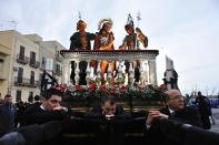 Third Place: During the Easter holy celebration called 'Misteri' (mistery) in Trapani, the devotees carry the scenes of Christís passion on their shoulders all night long. When the day comes they take a break. (Photo and caption by Andrea Guarneri/National Geographic Traveler Photo Contest) <br> <br> <a href="http://travel.nationalgeographic.com/travel/traveler-magazine/photo-contest/2012/entries/gallery/winners/" rel="nofollow noopener" target="_blank" data-ylk="slk:Click here to see the National Geographic Traveler's Winners Gallery;elm:context_link;itc:0;sec:content-canvas" class="link ">Click here to see the National Geographic Traveler's Winners Gallery</a>