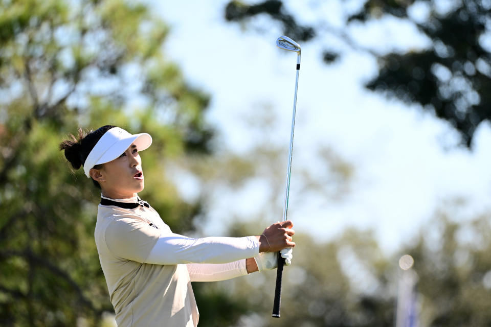 Amy Yang of Korea watches her shot from the ninth tee during the first round of The ANNIKA driven by Gainbridge at Pelican at Pelican Golf Club on November 09, 2023 in Belleair, Florida. (Photo by Julio Aguilar/Getty Images)