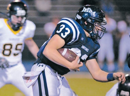 Jack Wiseman carries the ball for Bartlesville High during 2009 season action.