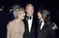 <p>Shirley Jones and David Cassidy smile at each other as Jack Cassidy looks on. Shirley and David both starred in the popular musical sitcom <em>The Partridge Family</em>. </p>